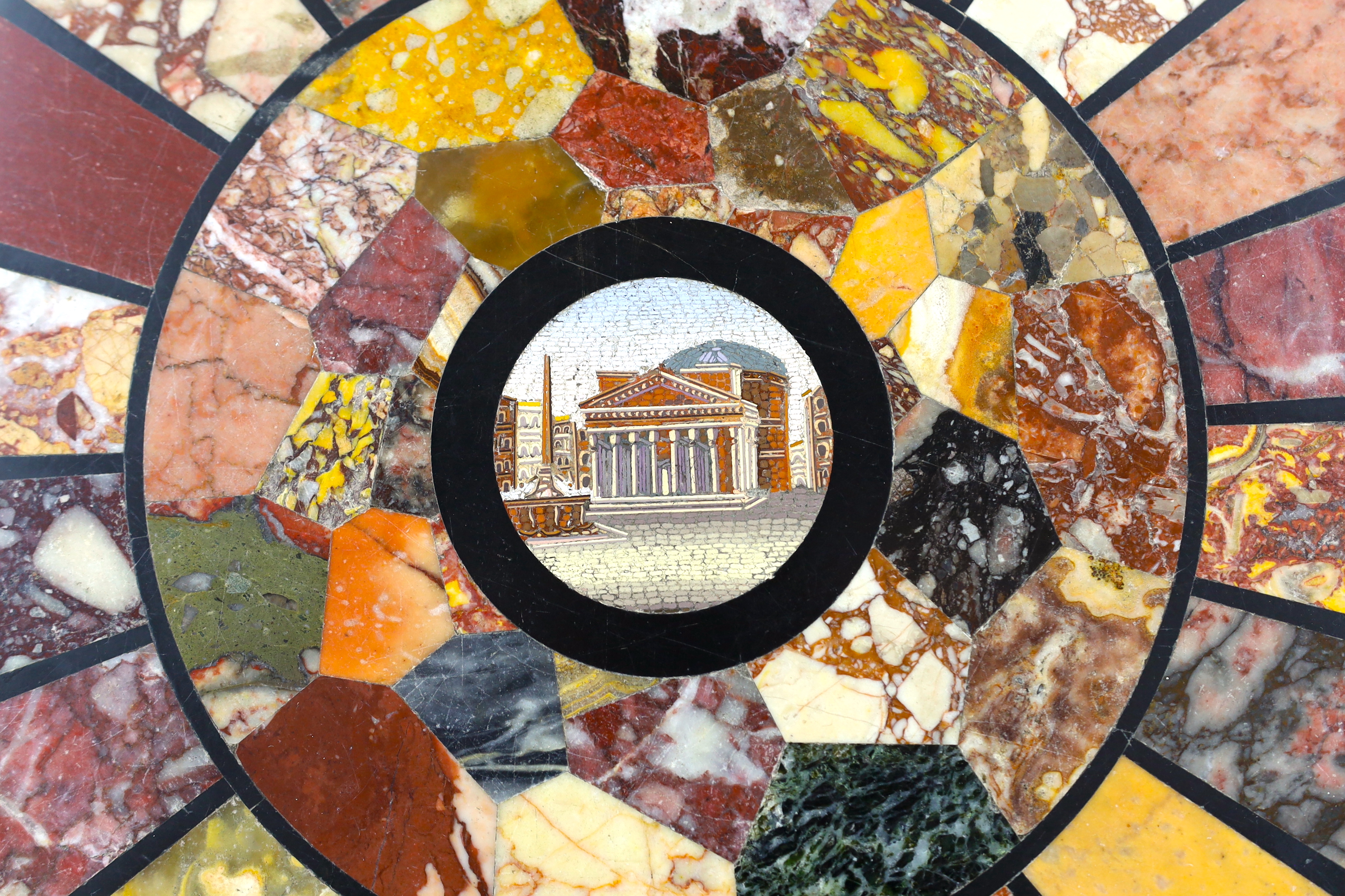 Orlandi Aristide, Via Sistina, a 19th century Italian micro-mosaic and specimen marble circular plaque, probably made for a table top, 35.5cm diameter